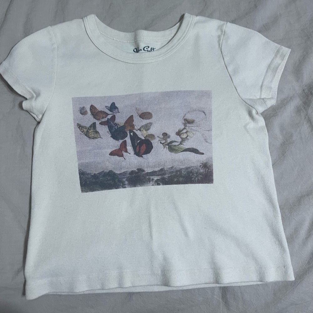 Brandy Melville Flower Butterfly atop